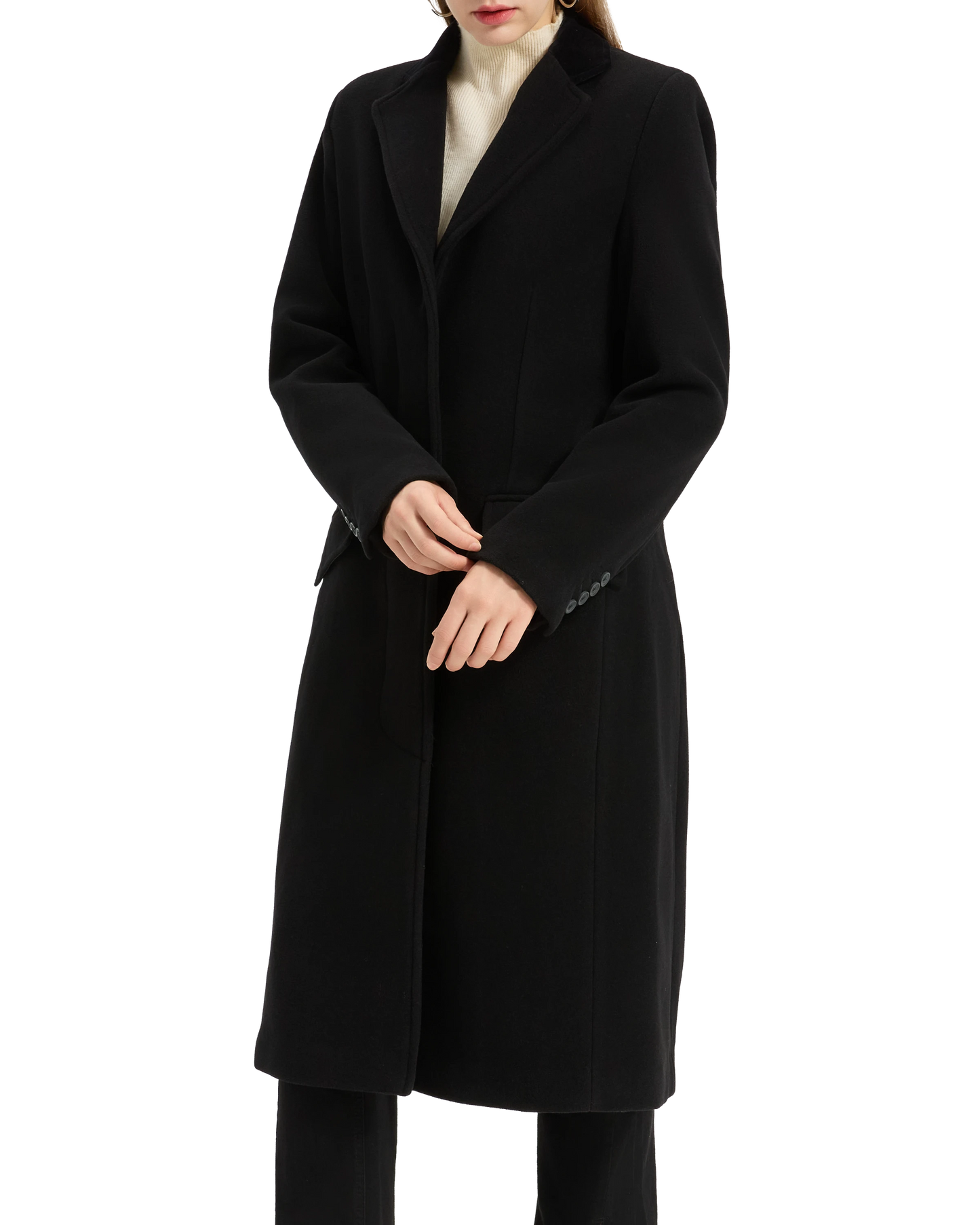 Model with the collar of the black covert overcoat turned up