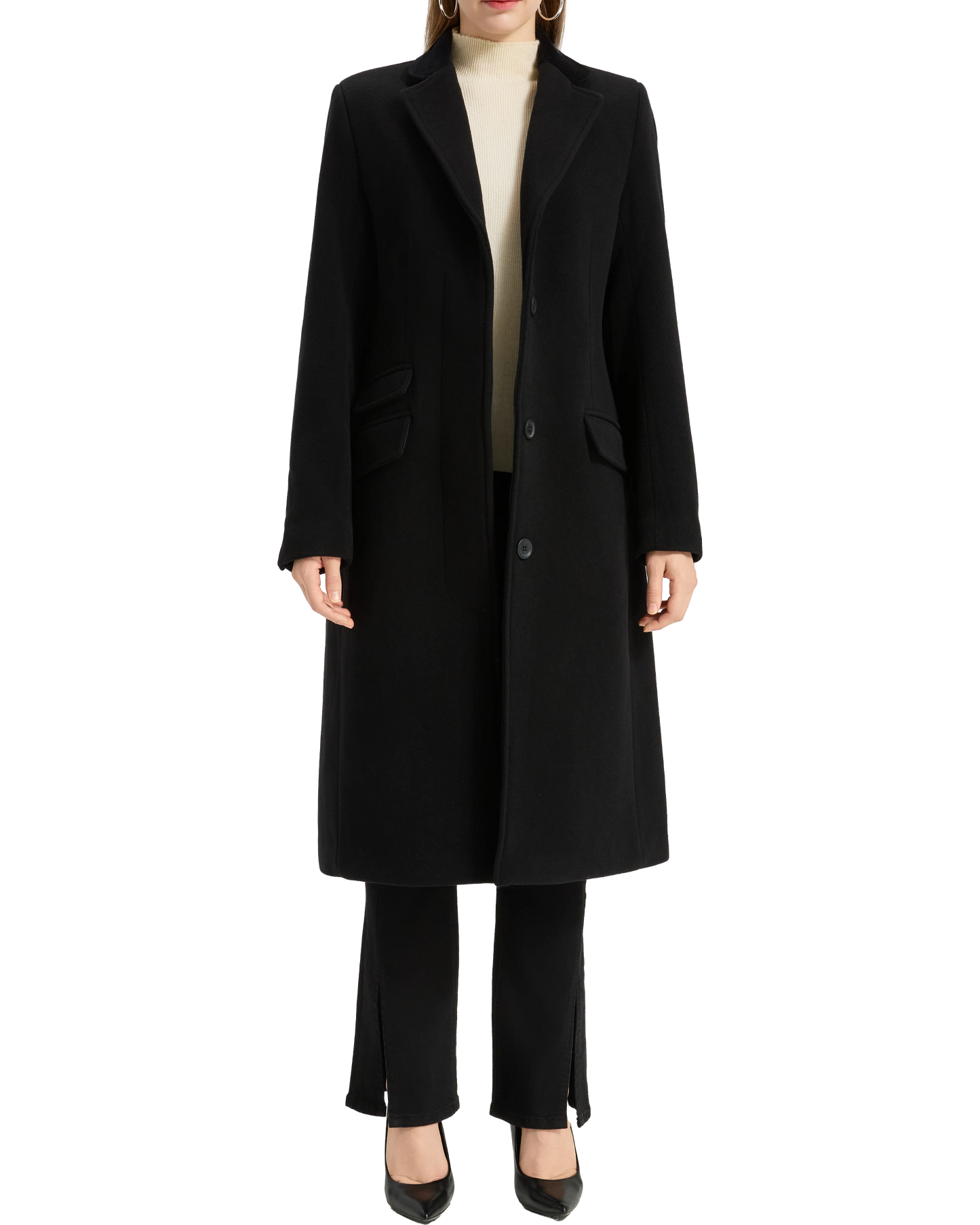 Model wearing the black covert overcoat buttoned over black trousers